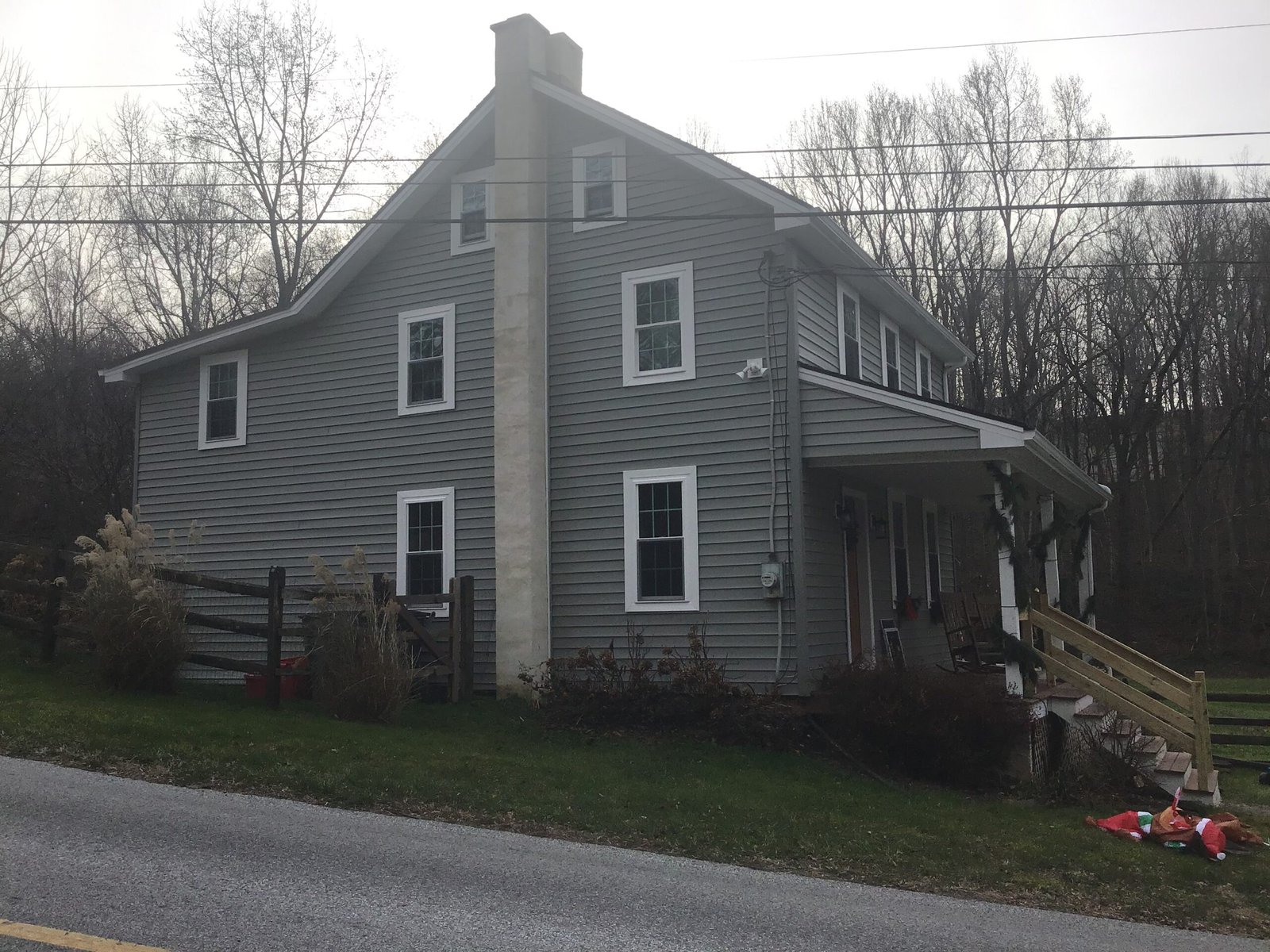 Before and after view of a major house exterior upgrade provided by local contractors