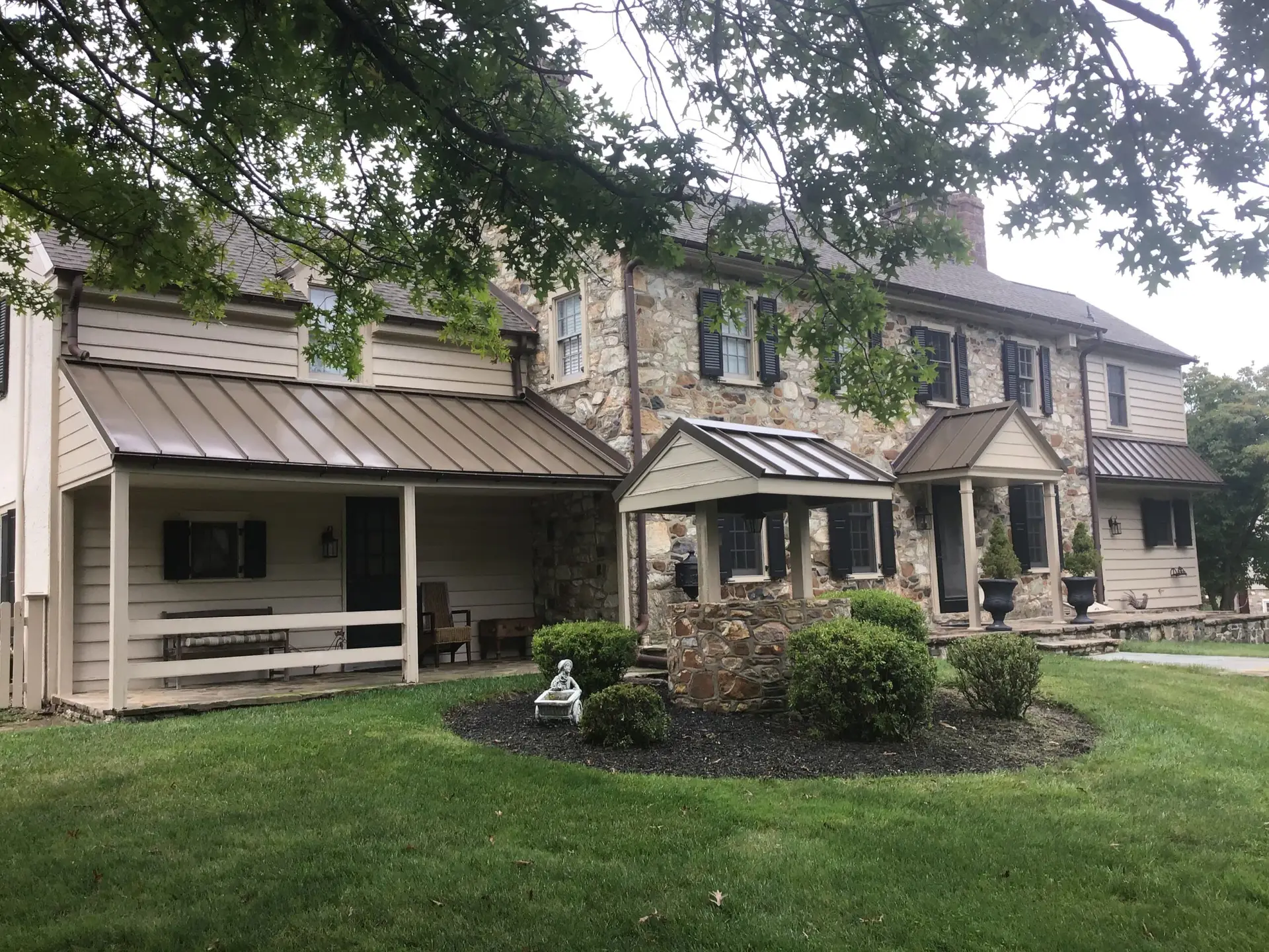 A certified roofing contractor services team preparing for a Roof Replacement in Villanova, PA