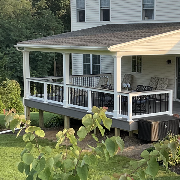 Two-story home with new covered porch and balcony