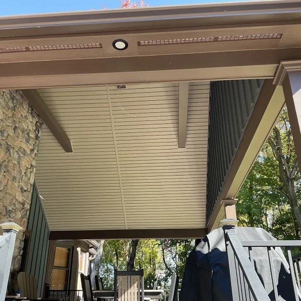 A covered porch with a soffit ceiling built by an exterior remodeler in St. Davids, PA.